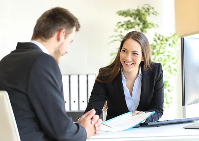 Illustration depicting employee liabilities, featuring legal documents, a gavel, and business professionals discussing workplace responsibilities.