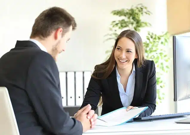Illustration depicting employee liabilities, featuring legal documents, a gavel, and business professionals discussing workplace responsibilities.