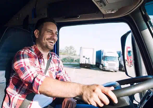 insure-your-trucks The road stretches into the distance, surrounded by flat, rural land.