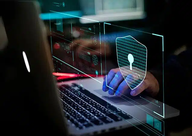 security-cyber A digital representation of cybersecurity featuring a shield icon with a keyhole, surrounded by a network of interconnected lines.