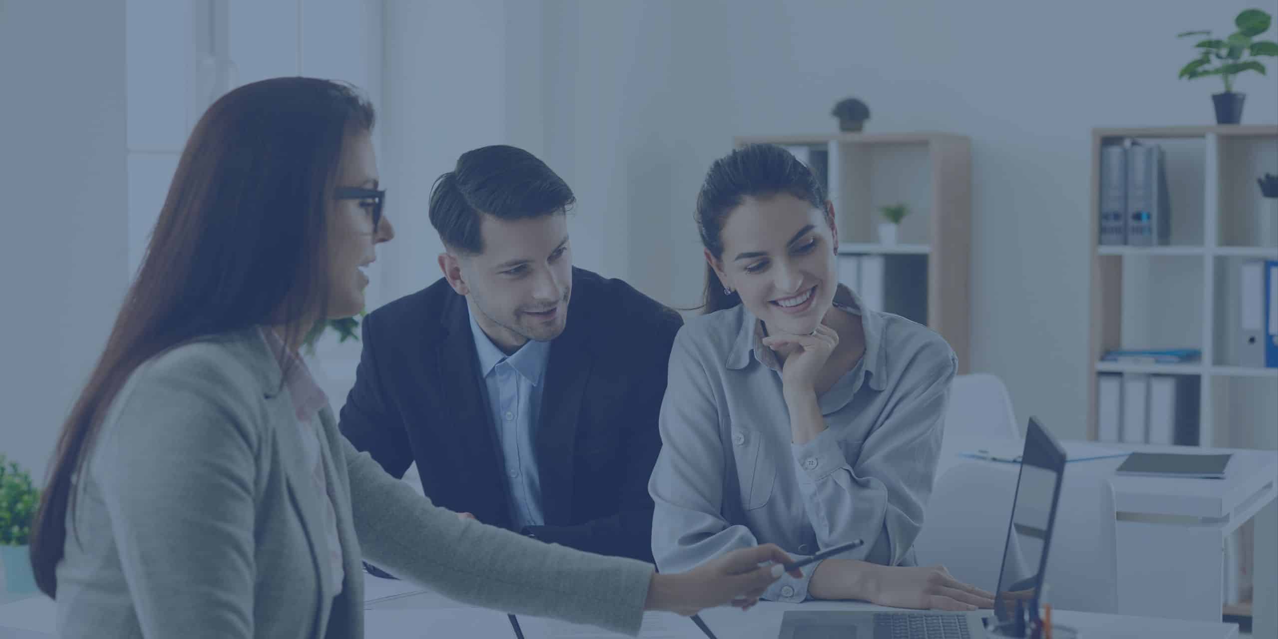 insurance agent discussing life insurance with a couple