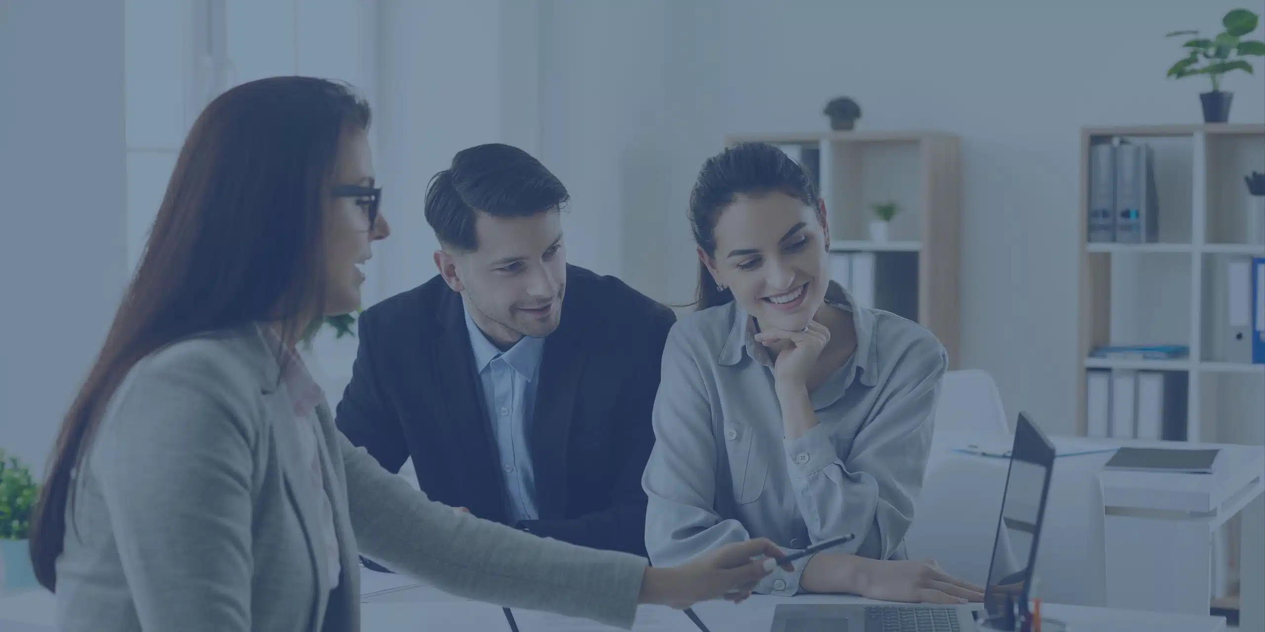 insurance agent discussing life insurance with a couple